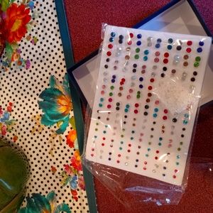 100 pairs of Hypoallergenic Plastic Post earrings..